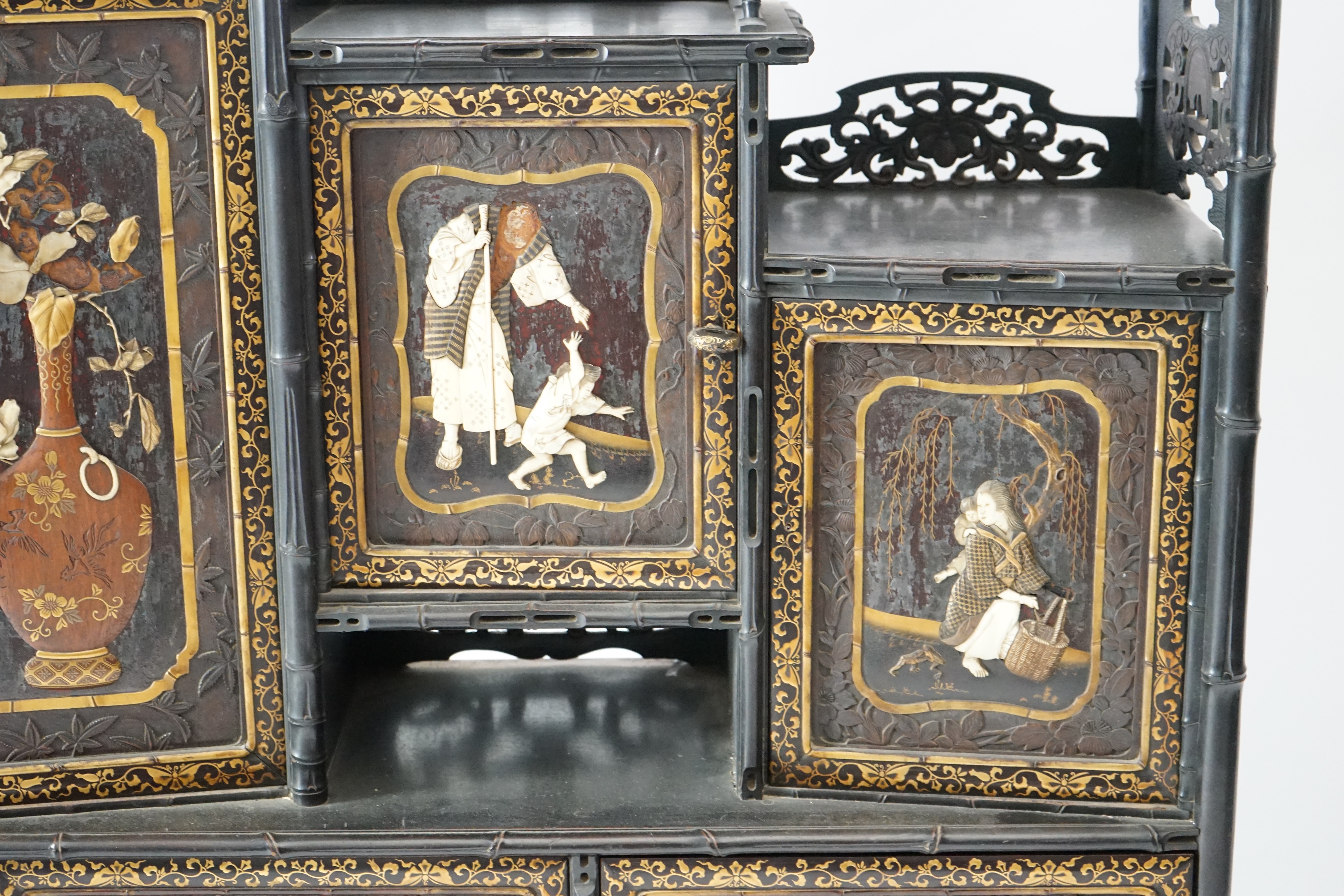 A Japanese Shibayama style inlaid wood cabinet, Meiji period